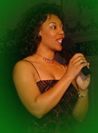 Multi-talented voiceover artist Andrea Perry as emcee at a formal social event.